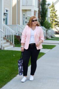 Pastel blazer, jeans, and white sneakers